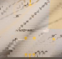 Whispering Pines Cottages - Accommodation Newcastle