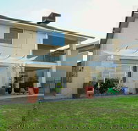 Waterfront Villa in Sanctuary Lakes - Accommodation Newcastle