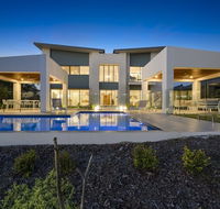 Luxury Canal Front Holiday House Raptor Pde Banksia Beach - Accommodation Newcastle