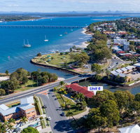 Elegant Waterfront Gem where the Ocean meets the Canal - Accommodation Newcastle