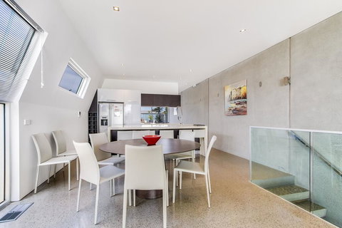 Nautilus 2 Luxury Retreat - Modern Beachfront Townhouse, WiFi, Water Views - Accommodation Newcastle 0