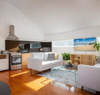 Sunlit Two-Bedroom Unit With Sprawling BBQ Deck - Accommodation Newcastle